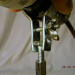 tighten nut on screw